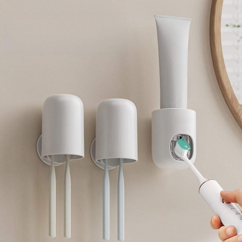 Wall-mounted bathroom organiser for toothbrushes and razors