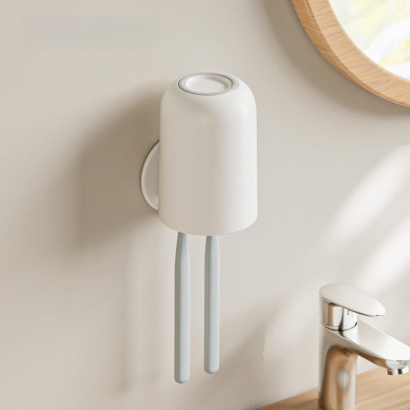 Adhesive toothbrush holder for bathroom walls